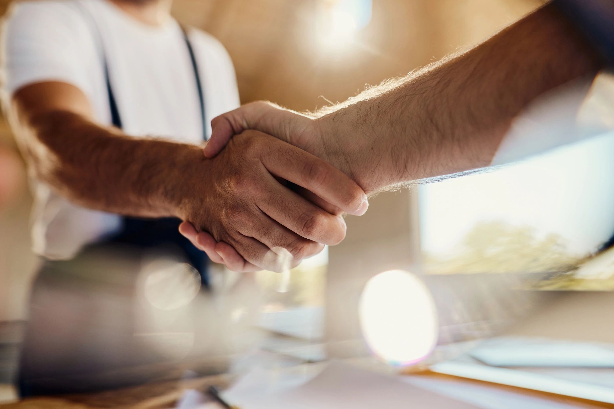 Close-up of a handshake representing a business agreement